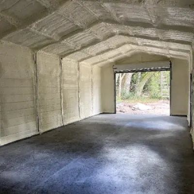 Open-cell spray foam on walls and roof of a metal building