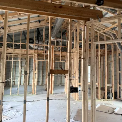 Wall cavities prepared for spray foam insulation