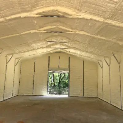 Spray foam insulated barrel-vault ceiling and walls