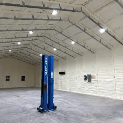 Insulated workshop with two-post lift